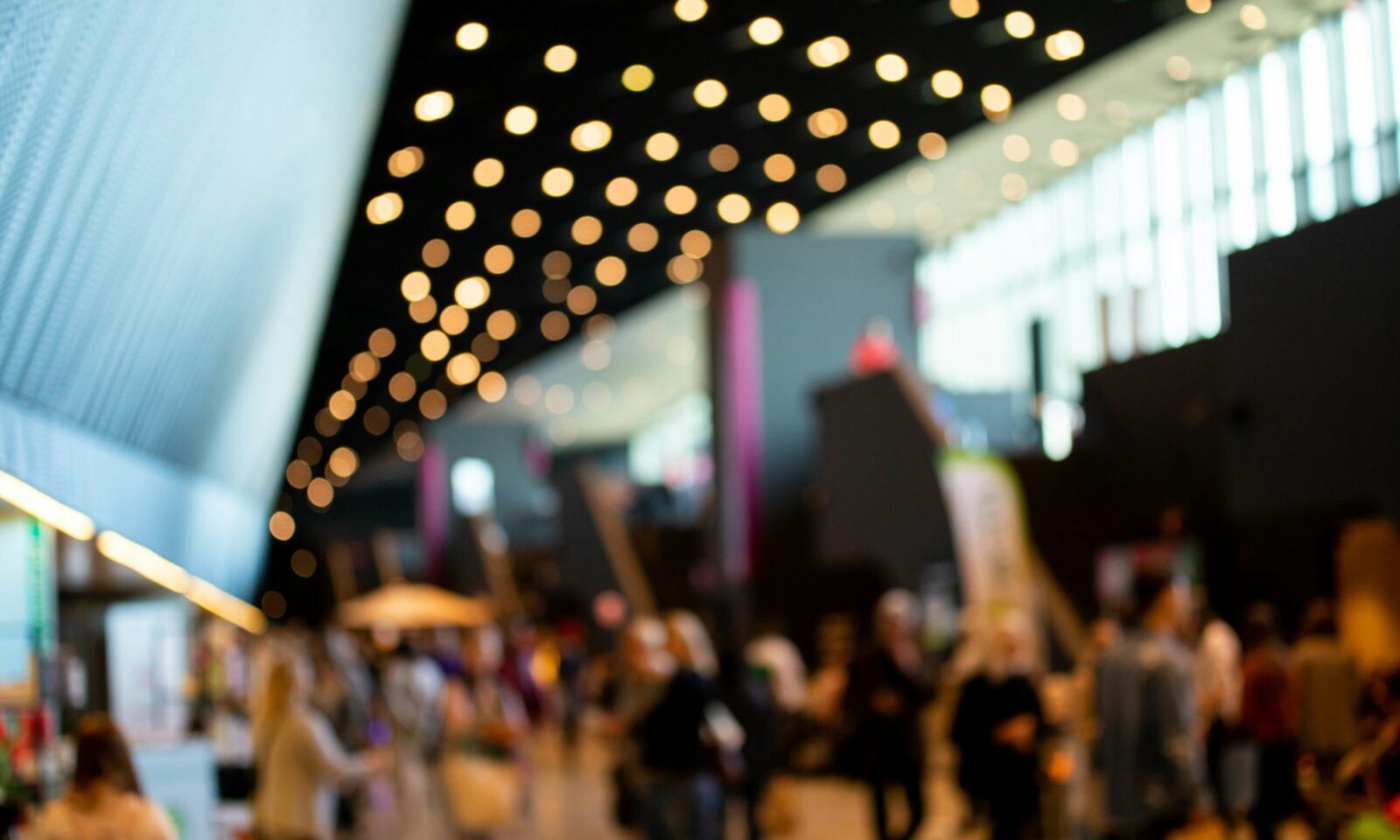 blurred-crowd-of-people-in-modern-interior-during-event