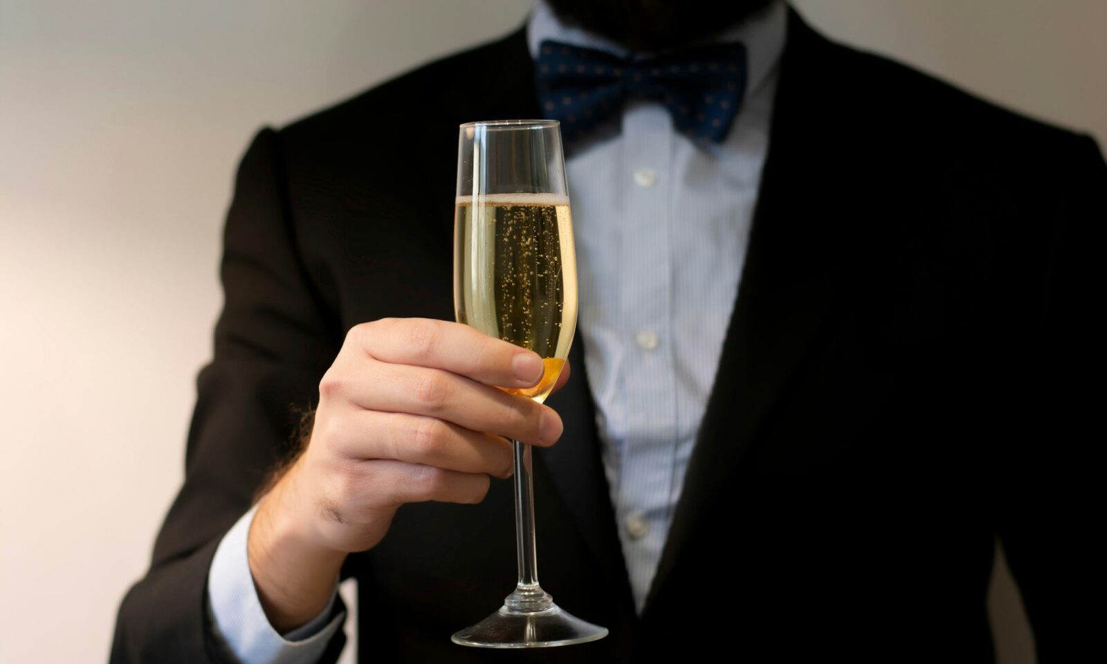 corporate-event-standing-young-man-with-wineglass-of-champaghe