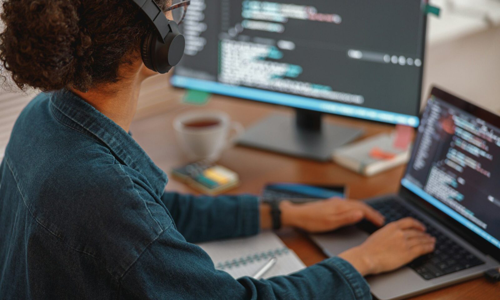 female-freelancer-making-new-project-as-web-designer-and-programmer-on-her-computer-at-home