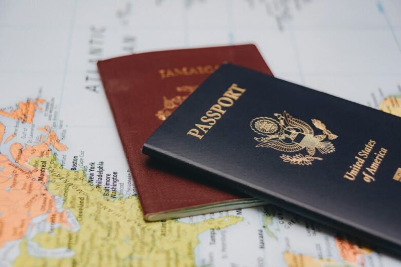 united-states-passport-and-jamaican-passport-on-world-map-1024x684-1